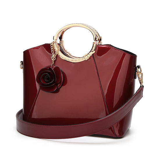 Fashionable patent leather glossy handbag