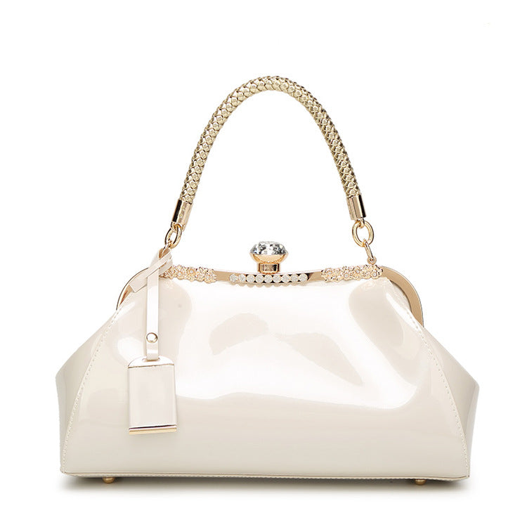 Handbag with diamond inlaid on lacquer finish
