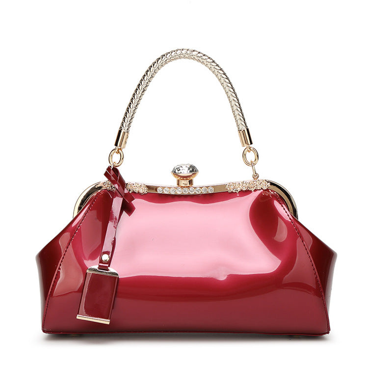 Handbag with diamond inlaid on lacquer finish