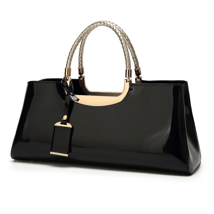 Fashionable glossy lacquer leather handbag