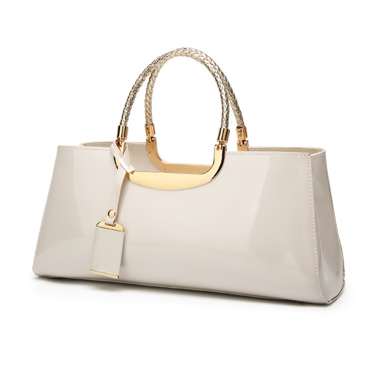 Fashionable glossy lacquer leather handbag