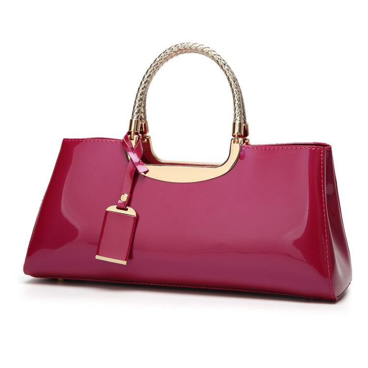 Fashionable glossy lacquer leather handbag