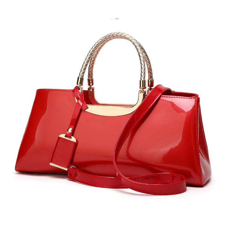 Fashionable glossy lacquer leather handbag