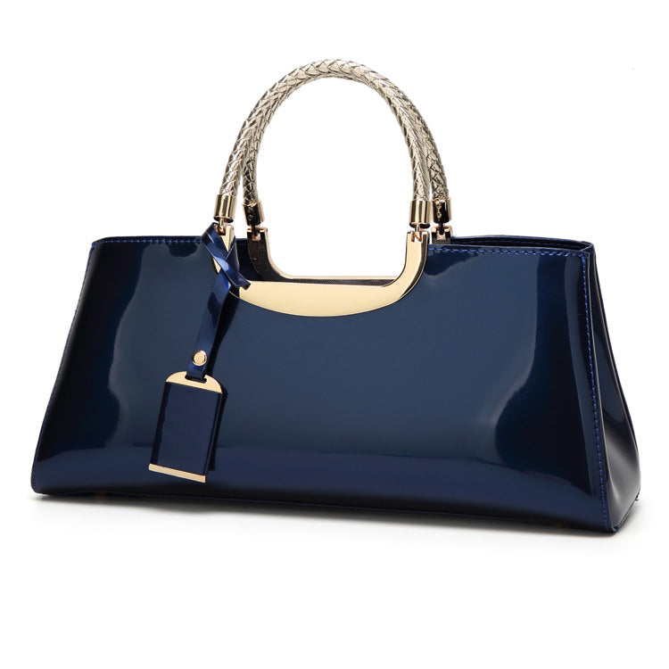 Fashionable glossy lacquer leather handbag