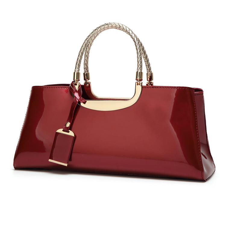 Fashionable glossy lacquer leather handbag