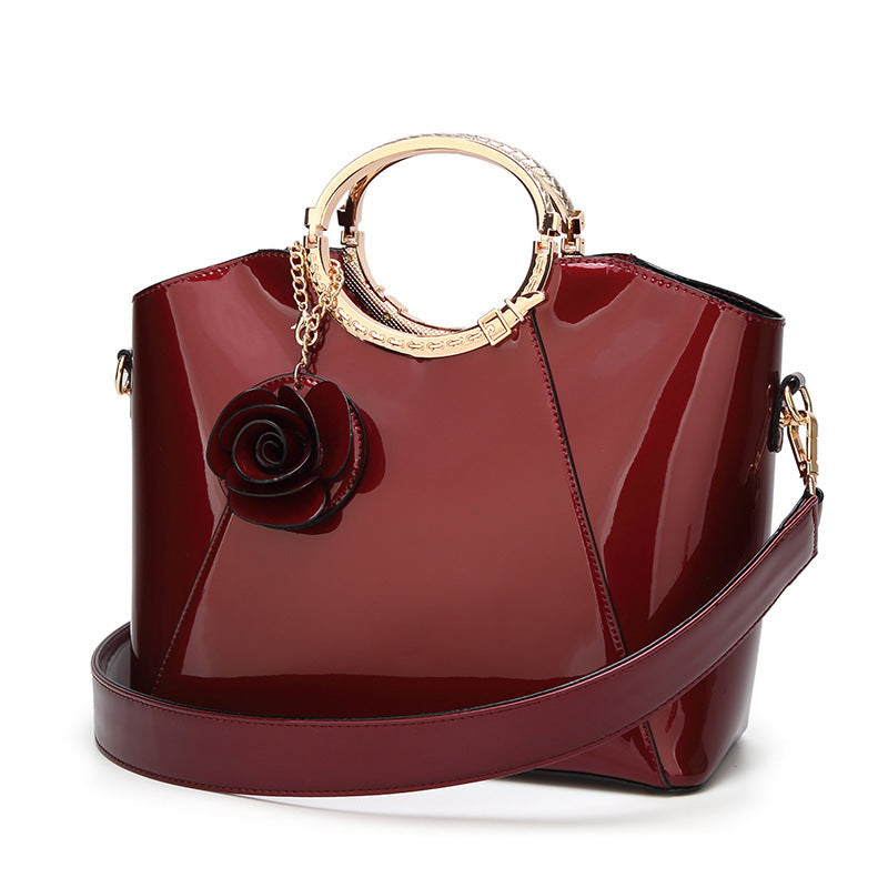 Fashionable patent leather glossy handbag