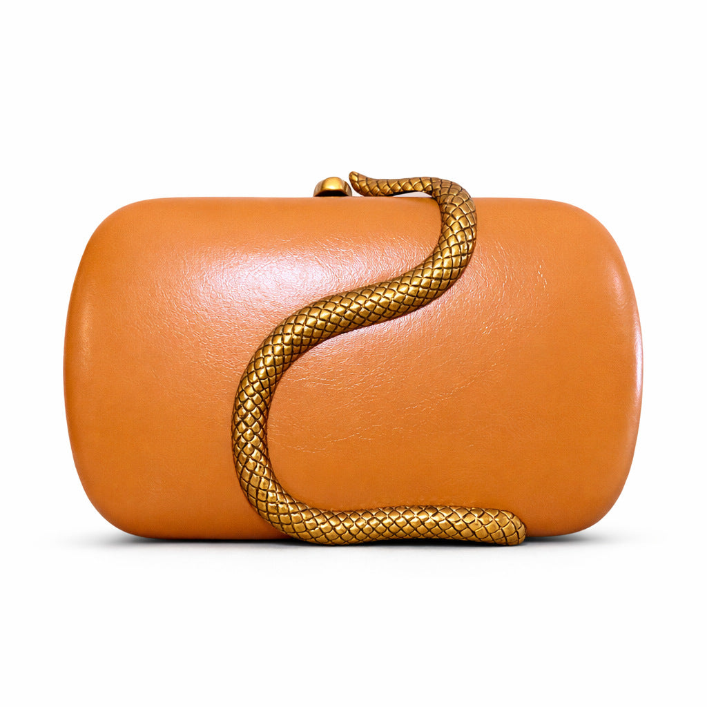 Snake-embossed metal shoulder bag