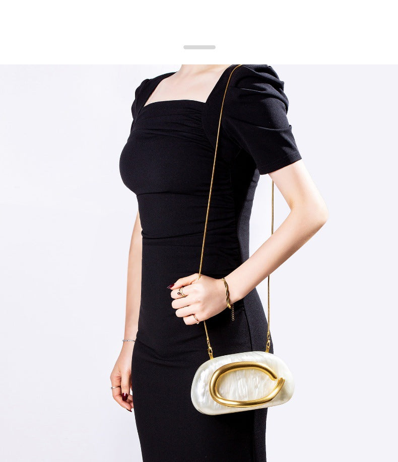 Pearlized Acrylic Evening Clutch with Gold Curved Handle